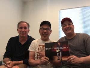 Wayne Federman with hosts Paco Romane and George Chen